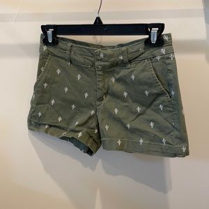 Green cactus print shorts
